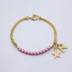 Personalised Gold Charm Bracelet Made with Pearls from Swarovski ®