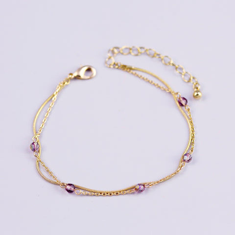Delicate Gold Bracelet with Light Amethyst Crystals