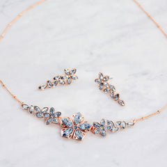 Blossom jewellery | rose gold jewellery set | rose gold necklace and earring set | Swarovski elements | blue crystals